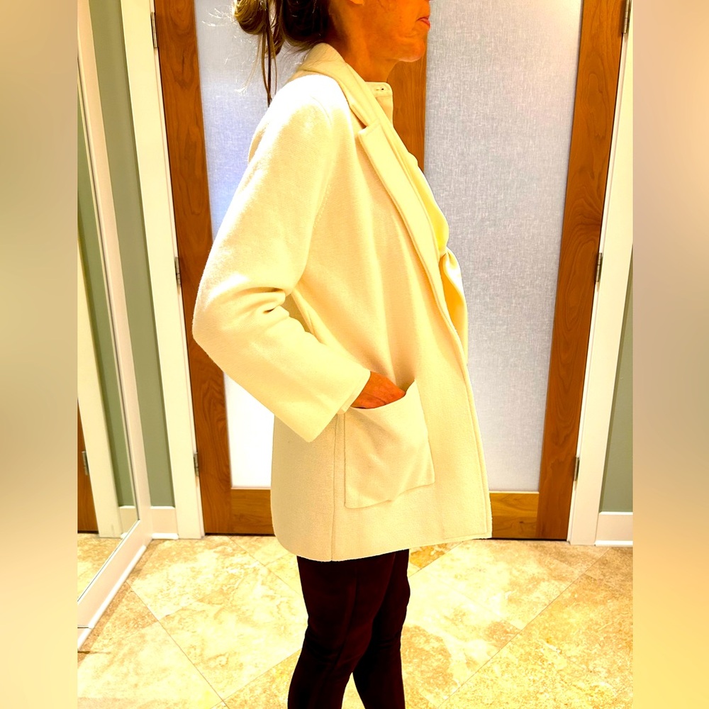 Beautiful and versatile cardigan sweater in cream by J Crew barely worn